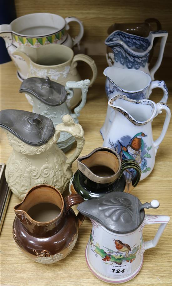 A quantity of assorted Victorian and other ceramic jugs including Doulton